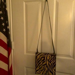 Fossil brand crossover body hair on hide front GUC